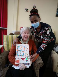 Resident And Staff Member From St. Francis Care Home