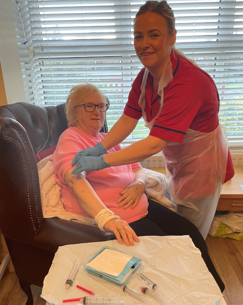 Ida Halfpenny receives care at home from Sr Maria McCann, District Nurse