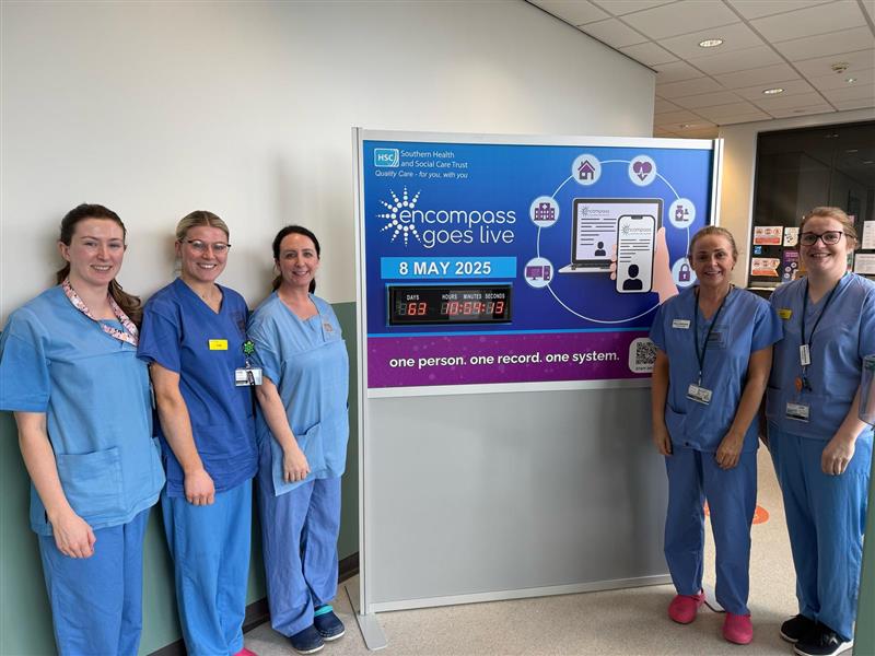 Staff at South Tyrone Hospital pictured at the encompass countdown clock in the hospital entrance.