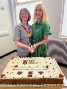 Edith Donnelly, Heart Failure Advanced Nurse Practitioner and Professor Patricia Campbell, Consultant Cardiologist and Heart Failure Lead pose with a cake to celebrate their success.