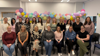 22 new midwives pictured not in uniform