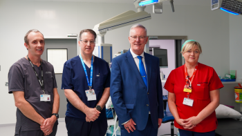 Health Minister Mike Nesbitt stands staff in Daisy Hill Hospital