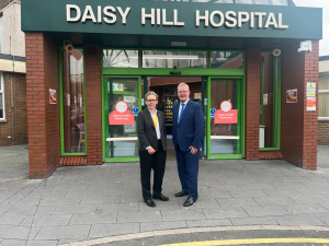 Health Minister Mike Nesbitt stands beside SHSCT Chair Eileen Mullan in front of Daisy Hill Hospital